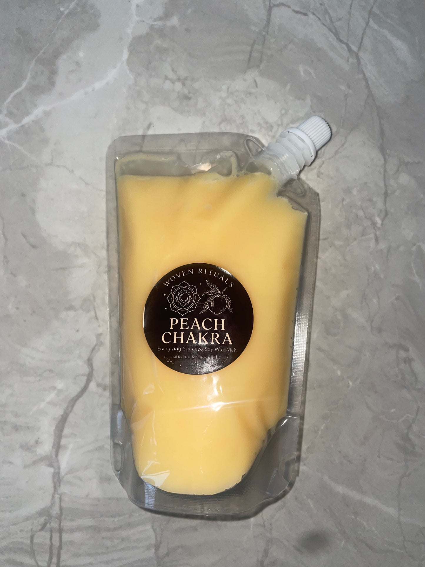 Peach chakra-squeeze wax