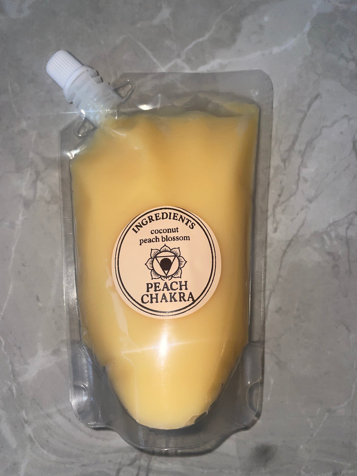 Peach chakra-squeeze wax
